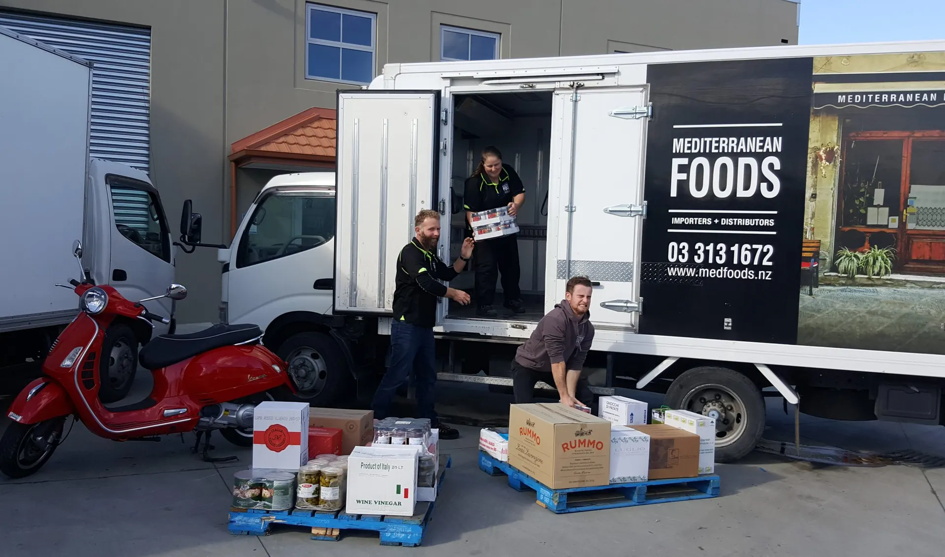 Fresca Wholesale team unloading the delivery truck